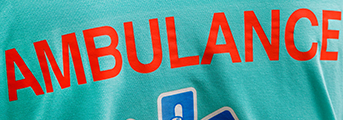 A close-up shot of an ambulance logo on a piece of clothing