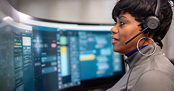 Woman looking at computer screen