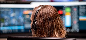 Woman looking at computer screen
