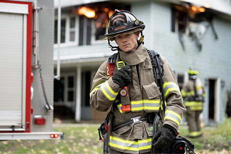 Firefighters in action with modern safety gear