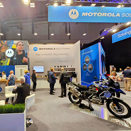 Motorola Solutions employee showing products at event