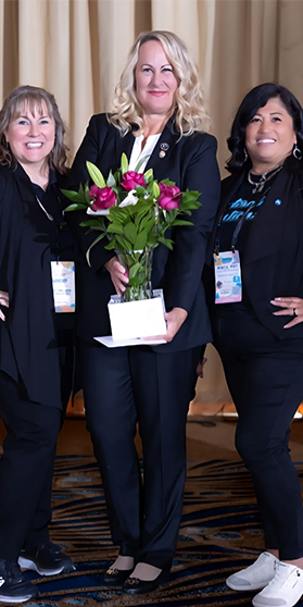 3 women pose for a photo