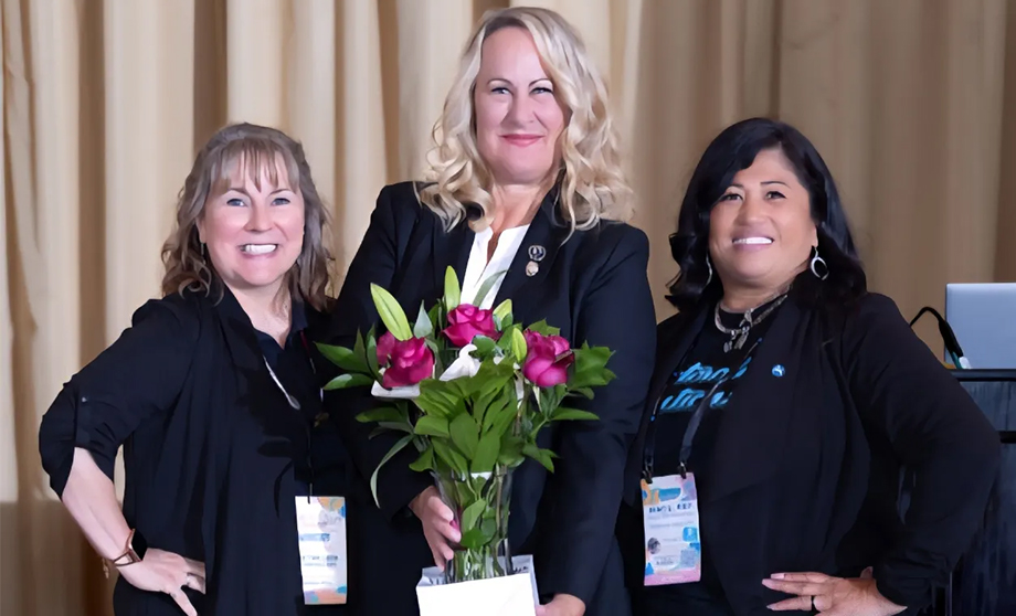 3 women pose for a photo