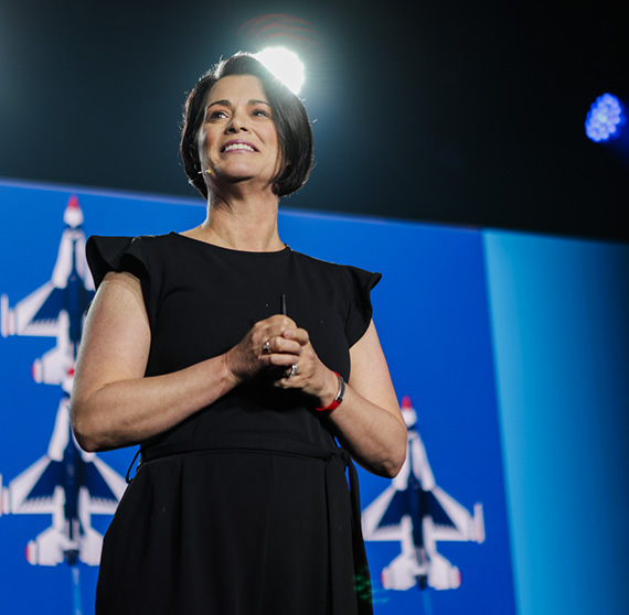 Colonel Nicole Malachowski (USAF, Retired) on stage at Summit 2026