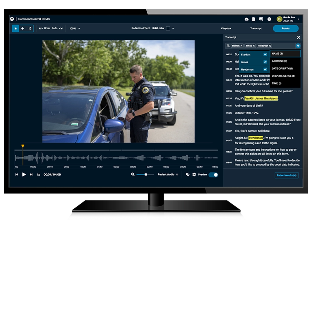 A computer monitor displaying the CommandCentral DEMS software during a redaction workflow. The video player on the left shows footage of a police officer standing at the window of a blue sedan during a daytime traffic stop, with an audio waveform visible below. On the right is a transcript of dialog between a police officer and the male in the vehicle.