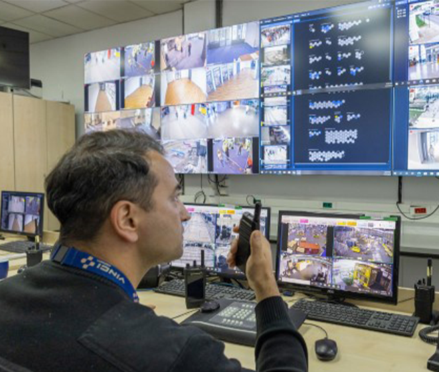 A Belgrade airport employee uses the video security system