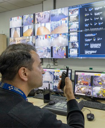 A Belgrade airport employee uses the video security system