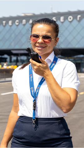 A Belgrade airport employee uses a radio