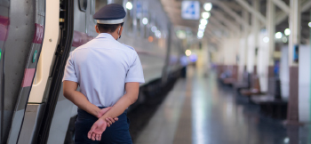 Train employee overlooking platform
