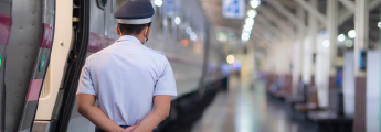Train employee overlooking platform