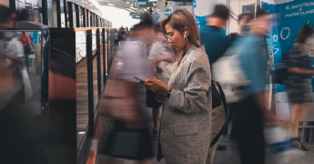 Passengers entering and exiting train car