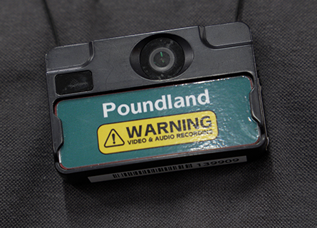 Retail employee wearing body worn camera