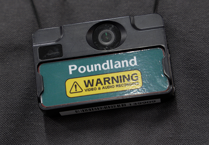 Retail employee wearing body worn camera