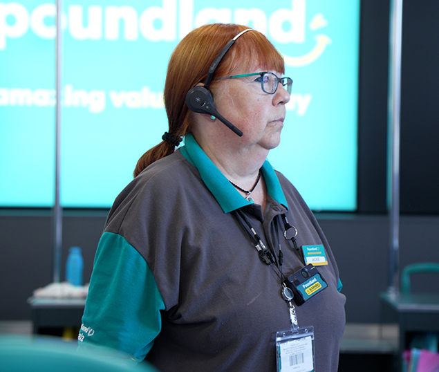 Retail manager wearing body worn camera