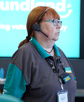 Retail manager wearing body worn camera