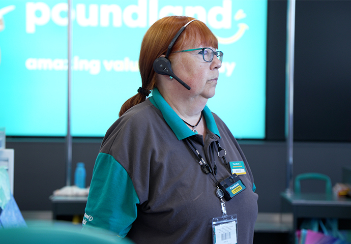 Retail manager wearing body worn camera