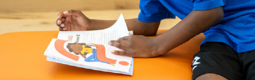 A student at Greater Dayton school reads a book