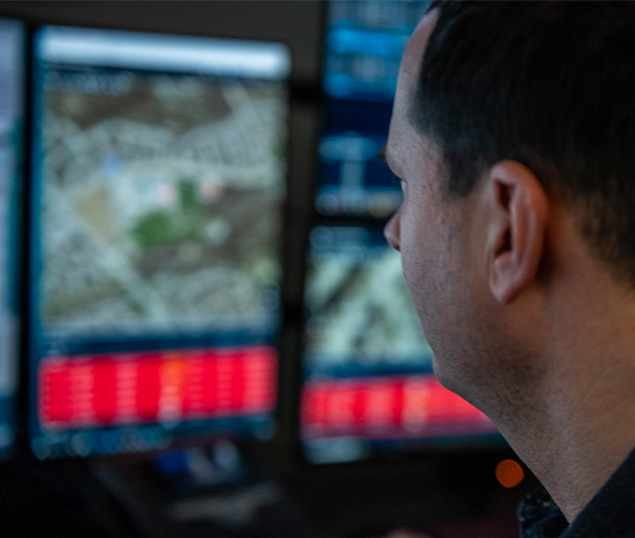 Dispatcher looking at computer screen