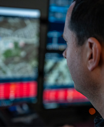 Dispatcher looking at computer screen
