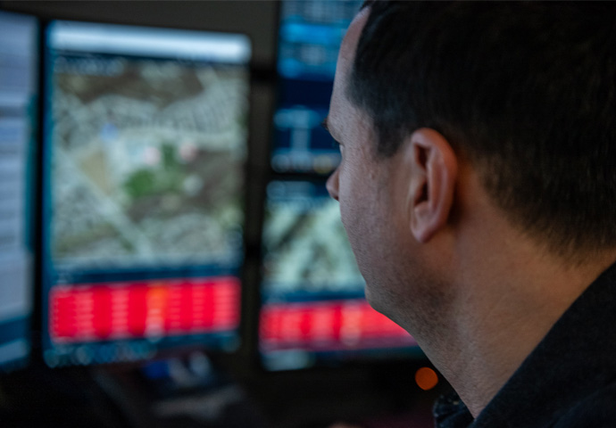 Dispatcher looking at computer screen