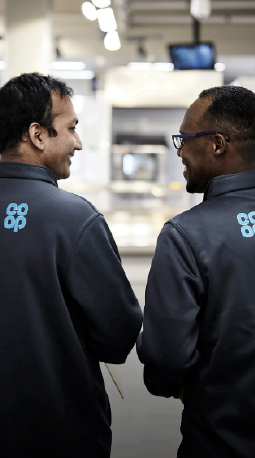 Two co-op colleagues instore
