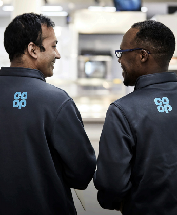 Two co-op colleagues instore