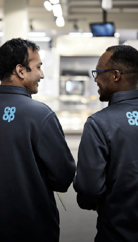 Two co-op colleagues instore