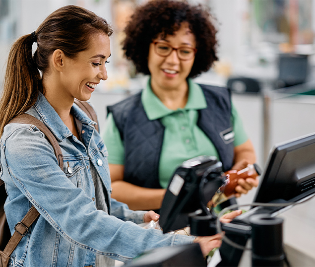 Shopper paying at checkout