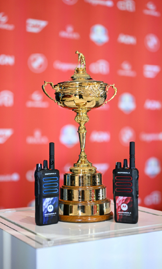 Motorola Solutions radios next to Ryder Cup trophy