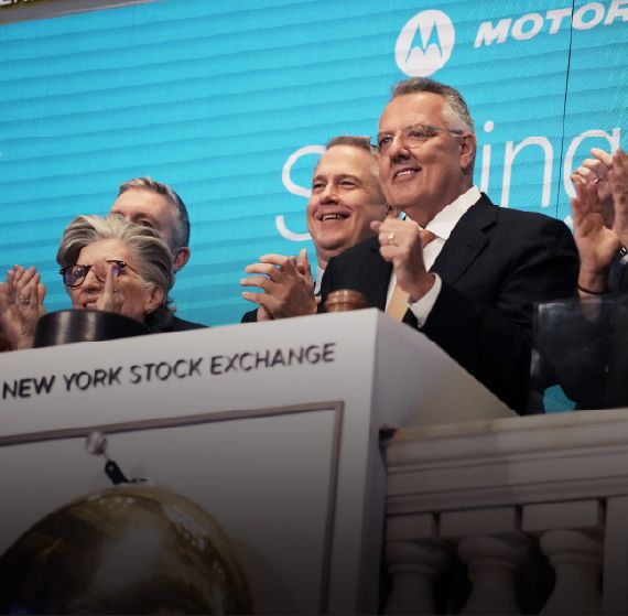 Greg Brown ringing the bell at the New York Stock Exchange