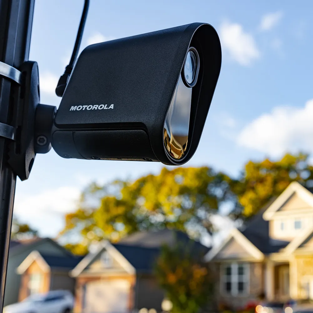 A license plate recognition camera on a pole.

