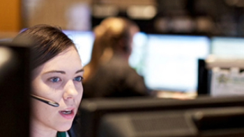 Image of a dispatcher with a headset