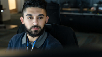 Image of a dispatcher with multiple screens