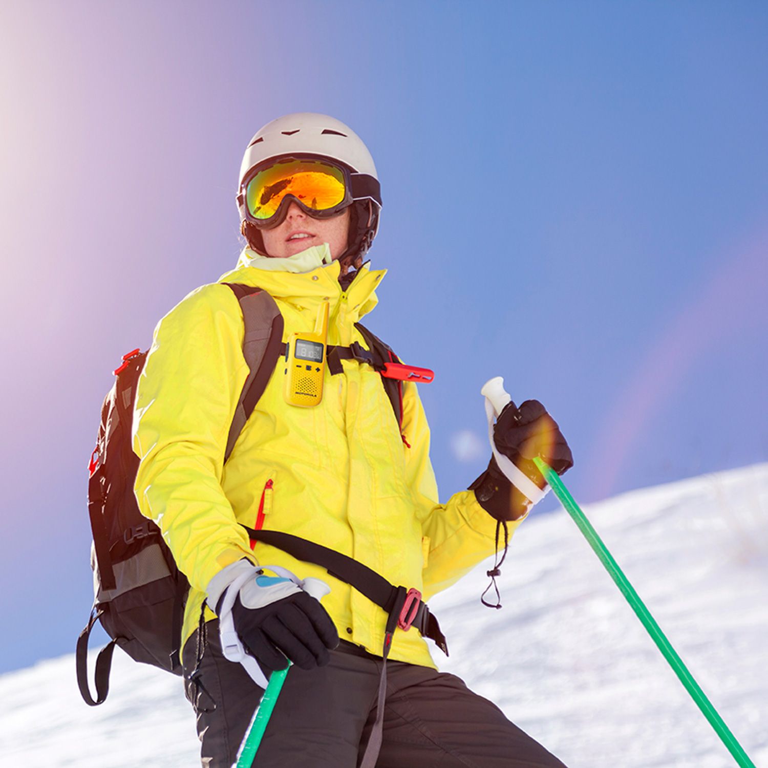 t380 (yellow) walkie talkie on woman skiing