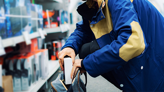 Man shoplifting from store