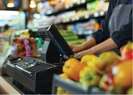 Grocery checkout counter with produce