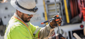 Workers use communication devices in even the toughest conditions. 