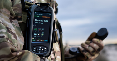 Barrett 4050 control handset attached to military uniform