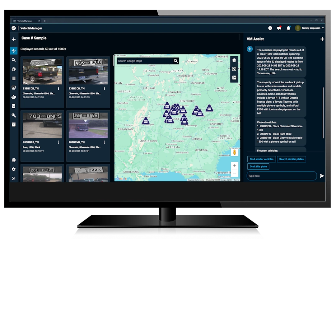 A monitor displaying a complex dashboard for a public safety vehicle search and identification system. The screen shows a map of a target vehicle’s location, an image of the vehicle, and a list of prior detections.