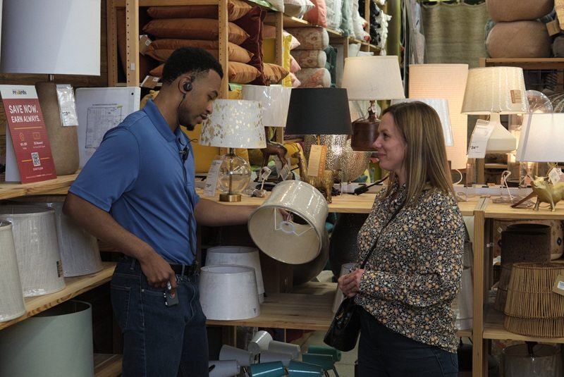 Photo of an employee helping a customer