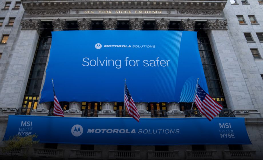 New York Stock Exchange with Motorola Solutions flag on the front