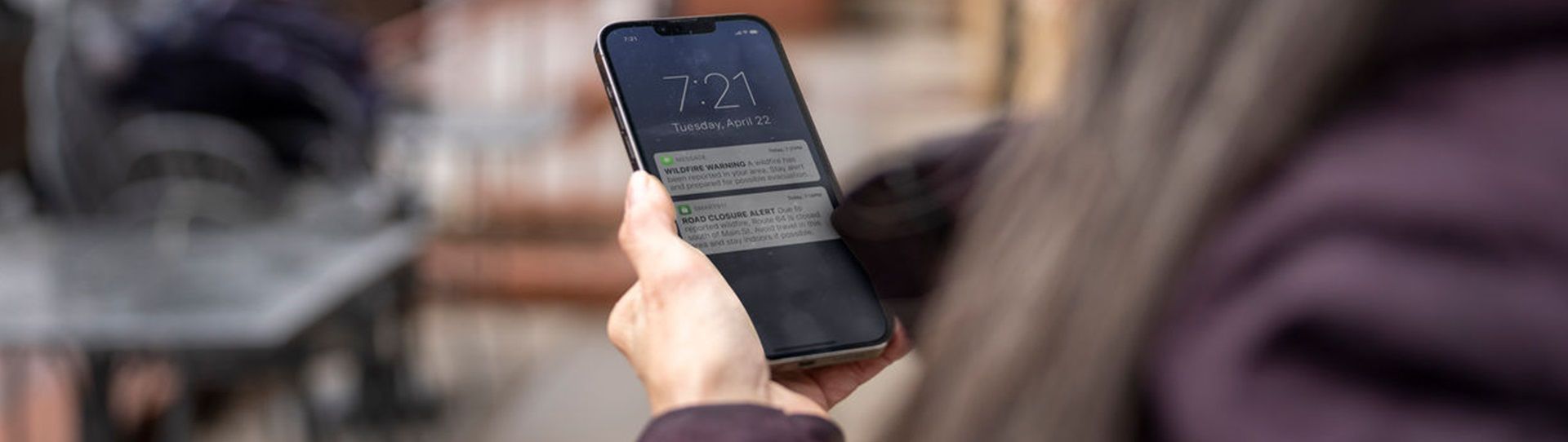Woman receiving a phone alert