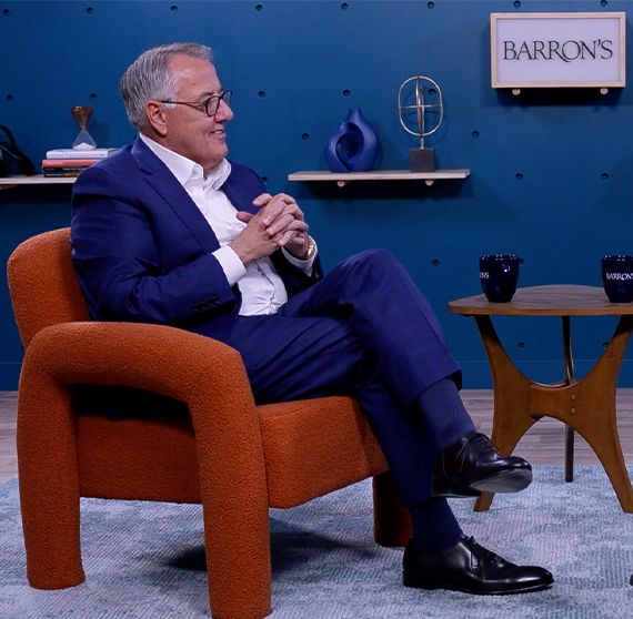 Image of Motorola Solutions CEO, Greg Brown, being interviewed by Barron's
