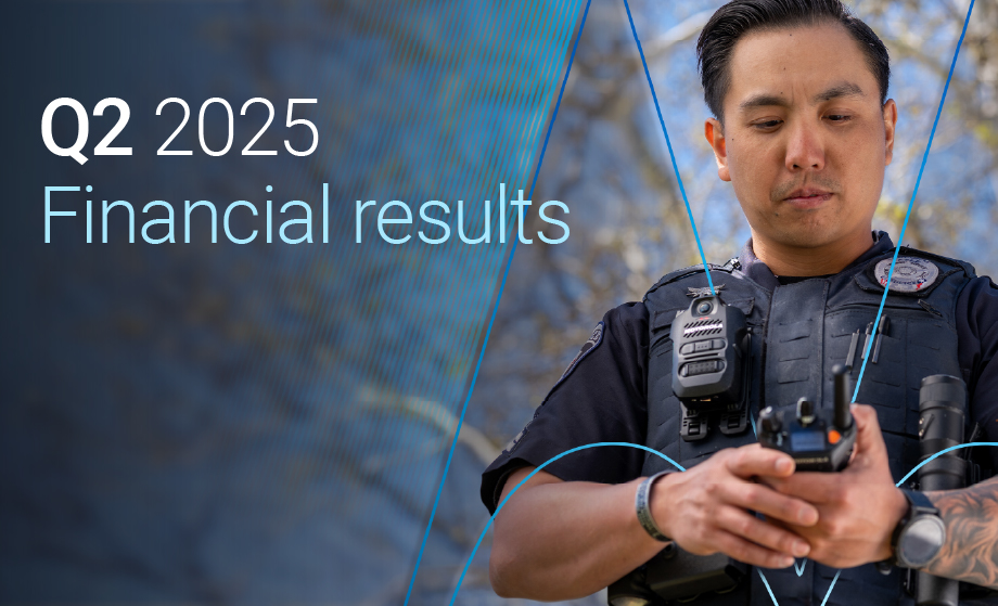 Image of male police officer handling a 2 way radio and advertisement to announce q2 2025 earnings